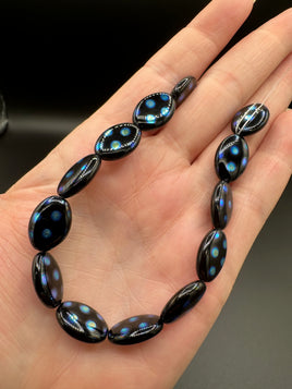 Czech Glass Peacock Eye Oval Bead Strand – Black & Iridescent Blue –