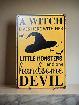 A Witch Lives Here Novelty Tin Sign