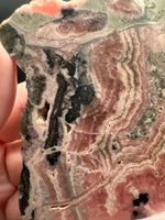 Natural Rhodochrosite Slab #17 – Pink Banded Mineral Specimen with Black Matrix