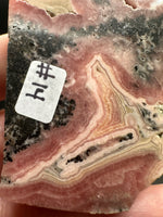 Natural Rhodochrosite Slab #14 – Pink Banded Mineral Specimen with Black Matrix & Natural Vugs