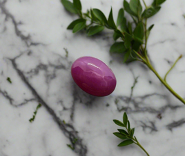 Lab Created Star Ruby 7x5mm Oval Cab 0.75ct