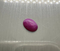 Lab Created Star Ruby 7x5mm Oval Cab 0.75ct