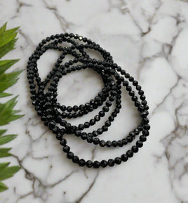 Black Spinel 4mm Faceted 7.5” Stretch Bracelet