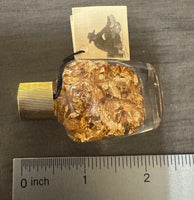 Gold Flakes in Glass Bottle