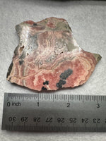 Natural Rhodochrosite Slab #17 – Pink Banded Mineral Specimen with Black Matrix