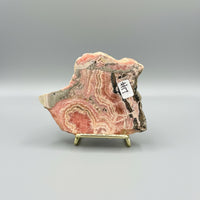 Natural Rhodochrosite Slab #17 – Pink Banded Mineral Specimen with Black Matrix
