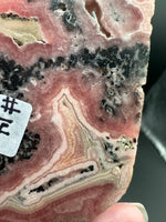Natural Rhodochrosite Slab #14 – Pink Banded Mineral Specimen with Black Matrix & Natural Vugs
