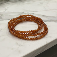 Hessonite Garnet 4mm Faceted 7.5” Stretch Bracelet