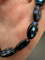 Czech Glass Peacock Eye Oval Bead Strand – Black & Iridescent Blue –