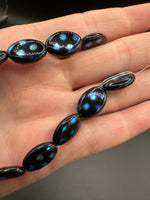 Czech Glass Peacock Eye Oval Bead Strand – Black & Iridescent Blue –