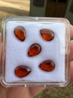 Parcel of Five Amber Colored Pearshape Stones