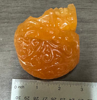 Orange Calcite Skull Carving #4