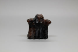 Carved Red Amphibole Ghost