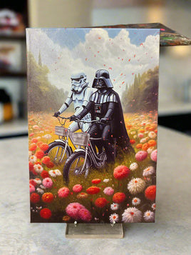 Vader & Storm Trooper Riding in a Field of Flowers Framed Canvas Print