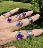Set of 9 Silvertone Fashion Rings Assorted Sizes