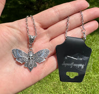 Retro Silvertone Skull Moth Pendant