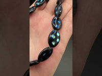 Czech Glass Peacock Eye Oval Bead Strand – Black & Iridescent Blue –